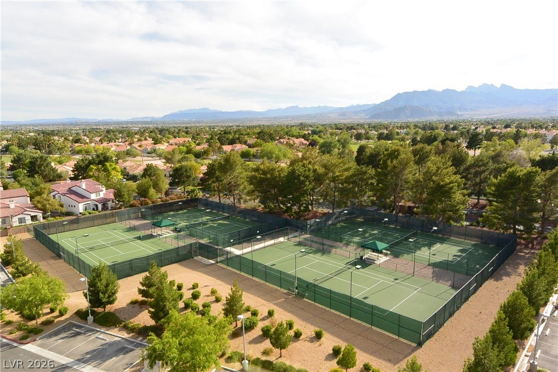 7652 Rolling View Drive, #202, Las Vegas, NV 89149 Professional-grade tennis courts enjoy a scenic mountain backdrop.