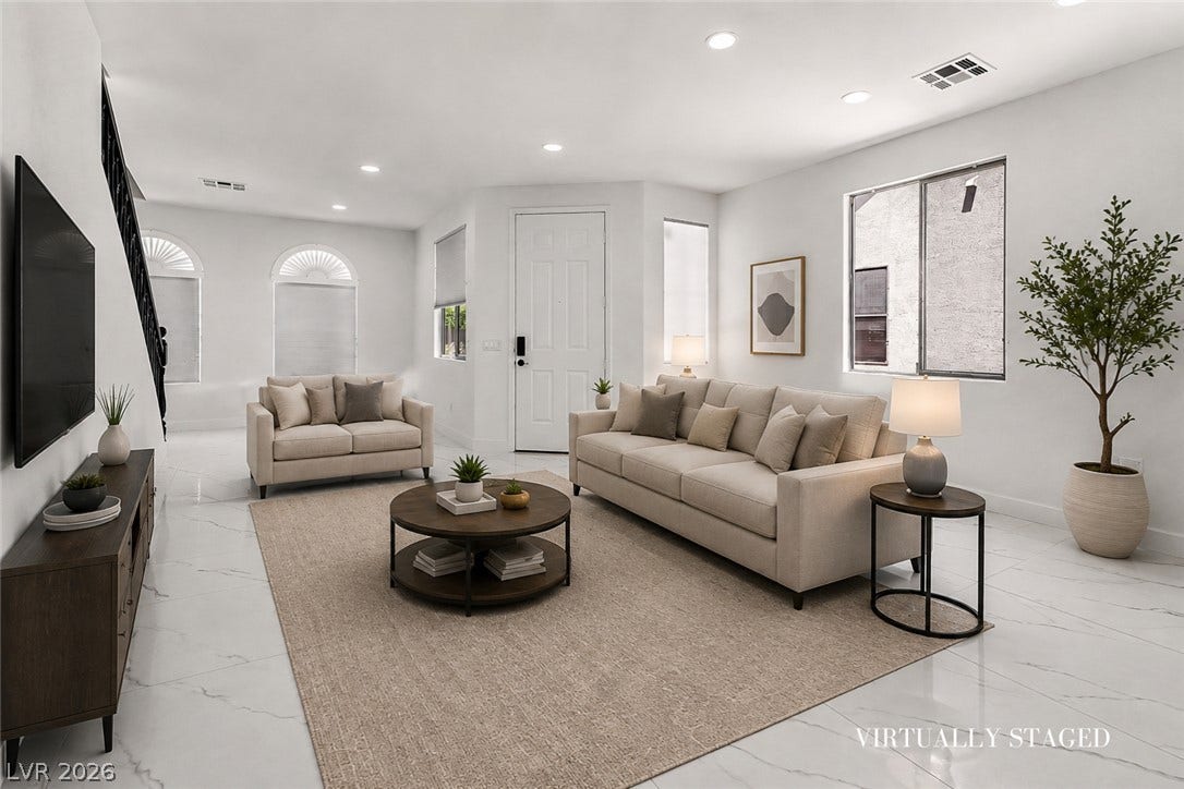 792 Valley Rise Drive, Henderson, NV 89052 Polished tile flooring and recessed lighting define this airy, open-concept living space.