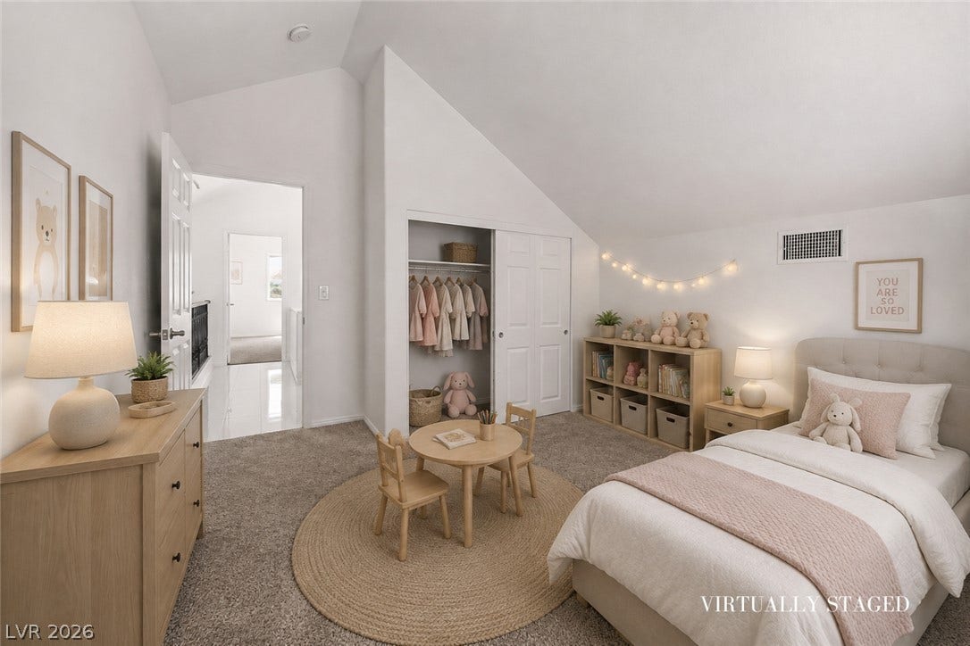 792 Valley Rise Drive, Henderson, NV 89052 Plush carpeting and vaulted ceilings define this peaceful upper-level bedroom.
