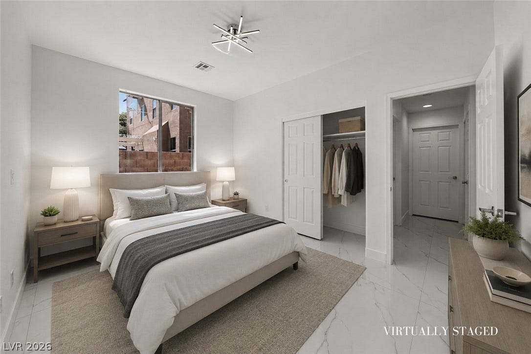 792 Valley Rise Drive, Henderson, NV 89052 Gleaming tile floors and clean architectural lines define this serene bedroom retreat.