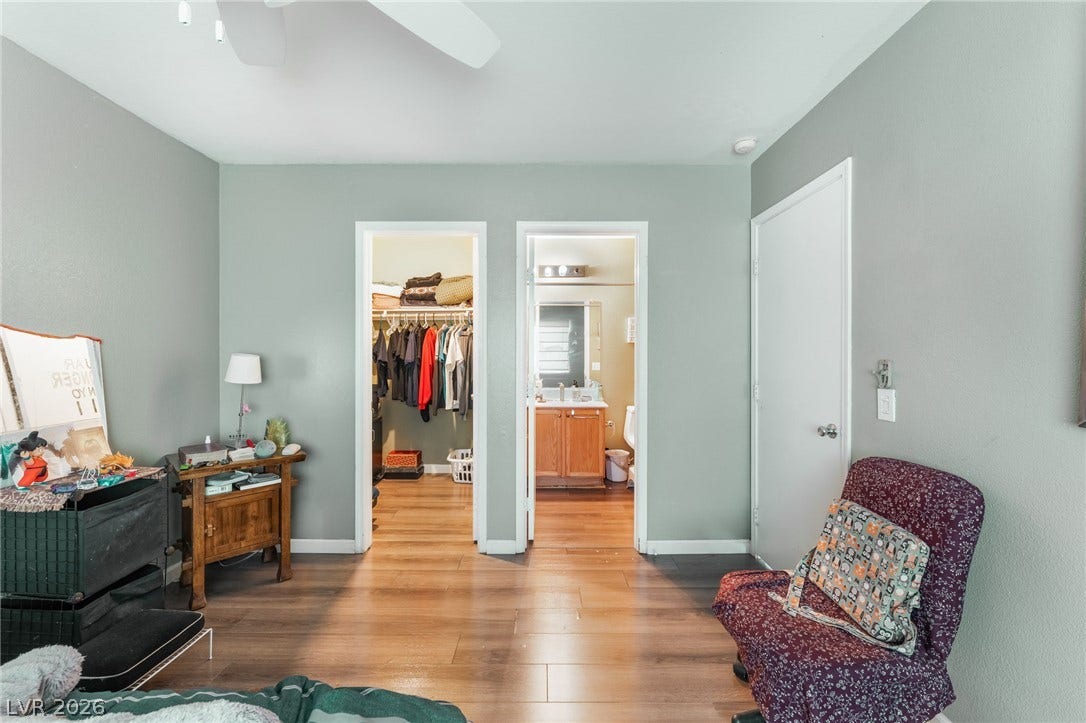 5348 Reardon Court, North Las Vegas, NV 89031 Smooth wood floors run through this comfortable bedroom suite with direct access to a bath.