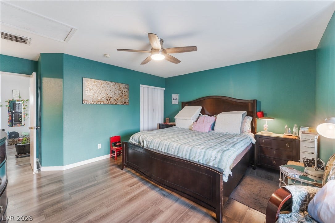 5348 Reardon Court, North Las Vegas, NV 89031 Gleaming wood-inspired floors flow throughout this peaceful bedroom retreat.