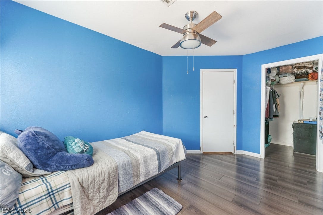 5348 Reardon Court, North Las Vegas, NV 89031 Gleaming hardwood floors and a spacious walk-in closet highlight this comfortable secondary bedroom.