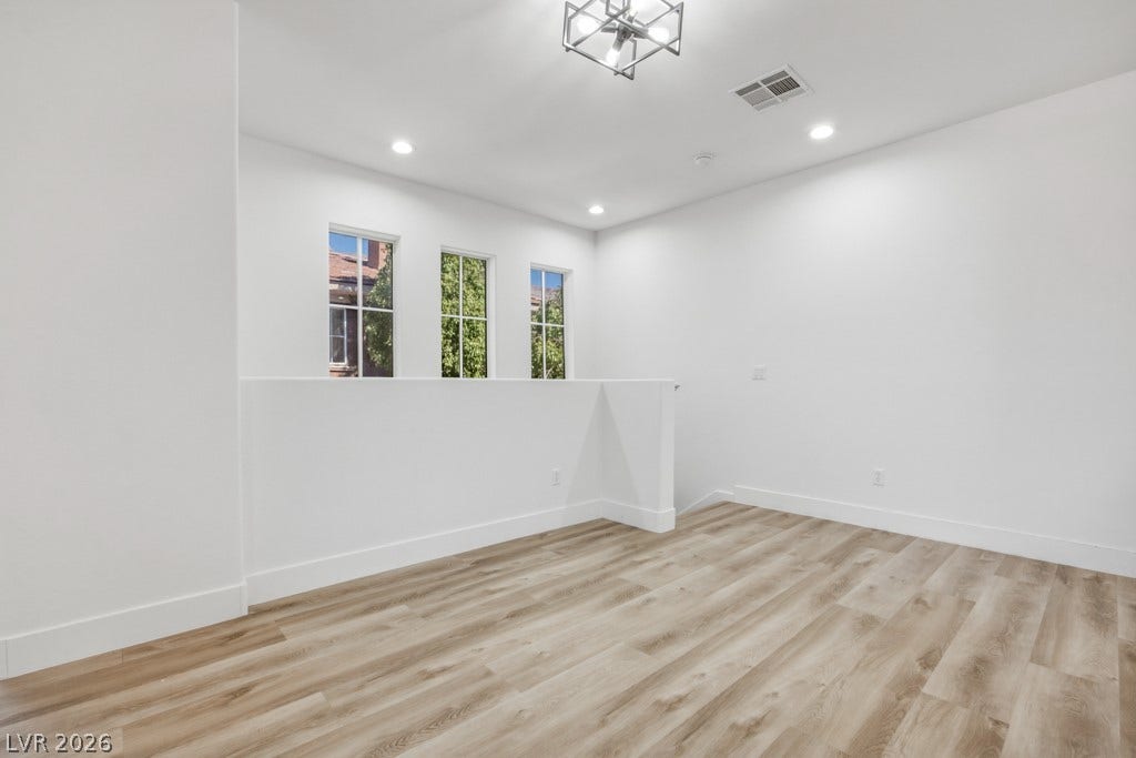 Lots of natural light from windows. Updated Dining Area light fixture.