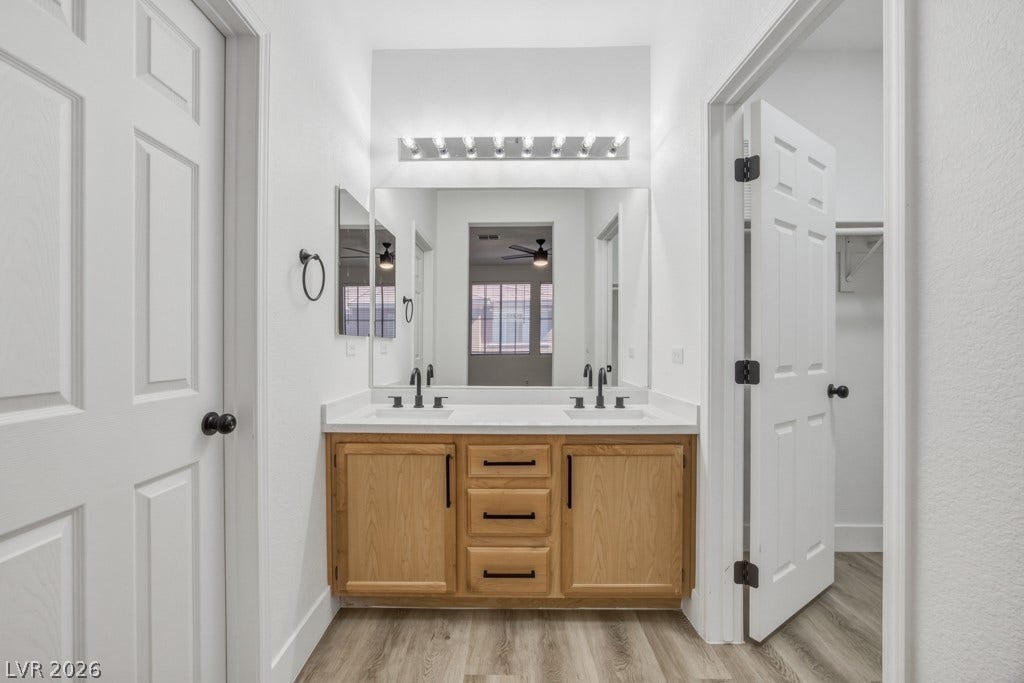 Your Primary Bath has double sinks, medicine cabinet for extra storage and a large walk-in closet.