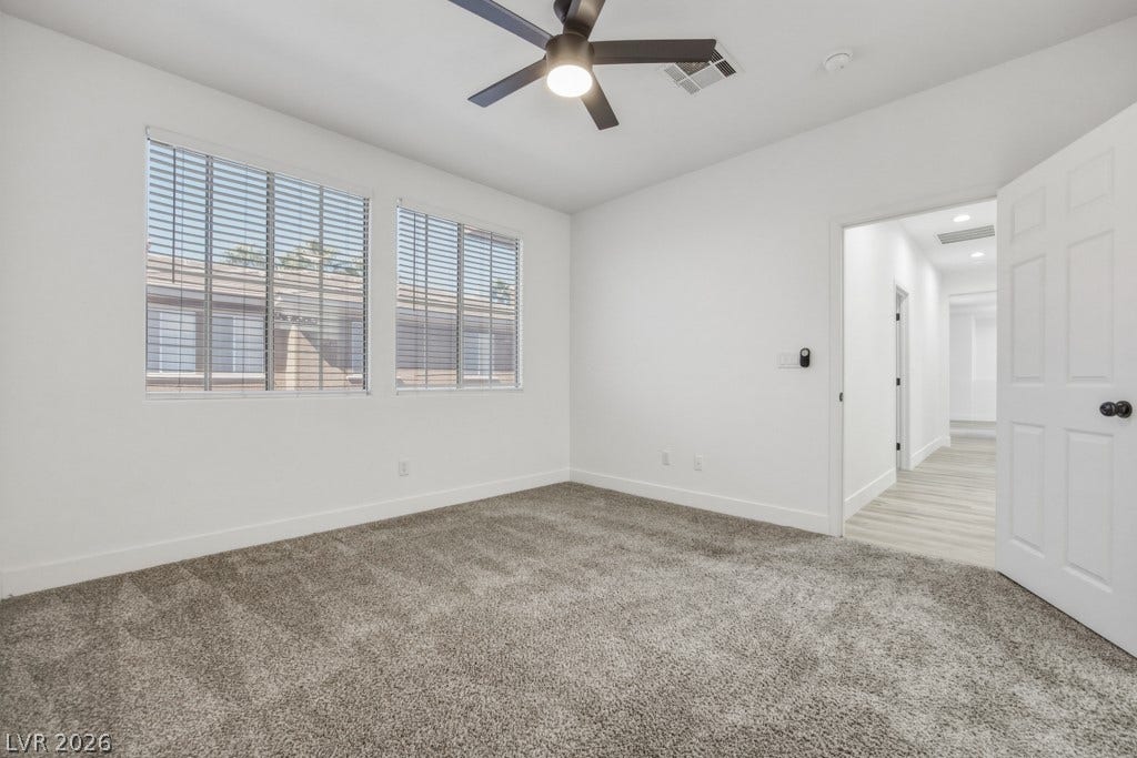 Your Primary Bedroom comes complete with Ceiling Fan/Light Fixture, freshly cleaned carpet and lots of windows for natural light. Please note many of the windows have solar screens to protect from the heat.