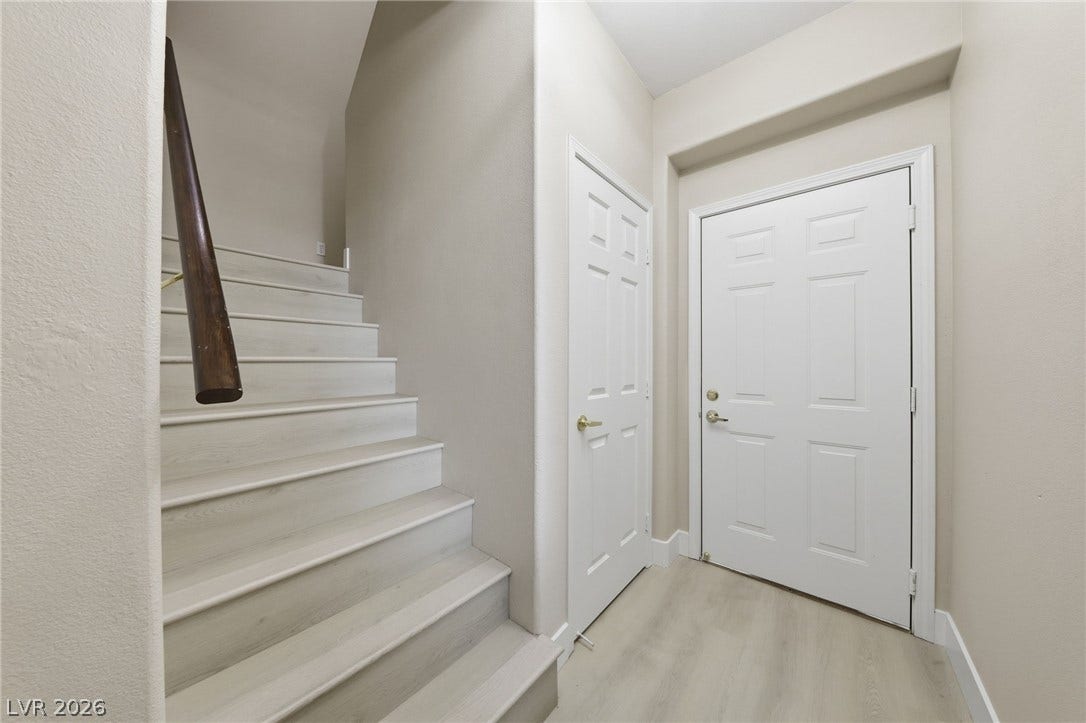 104 Lemon Glaze Street, #204, Las Vegas, NV 89145 A welcoming entryway transitions seamlessly into light flooring and a clean staircase.