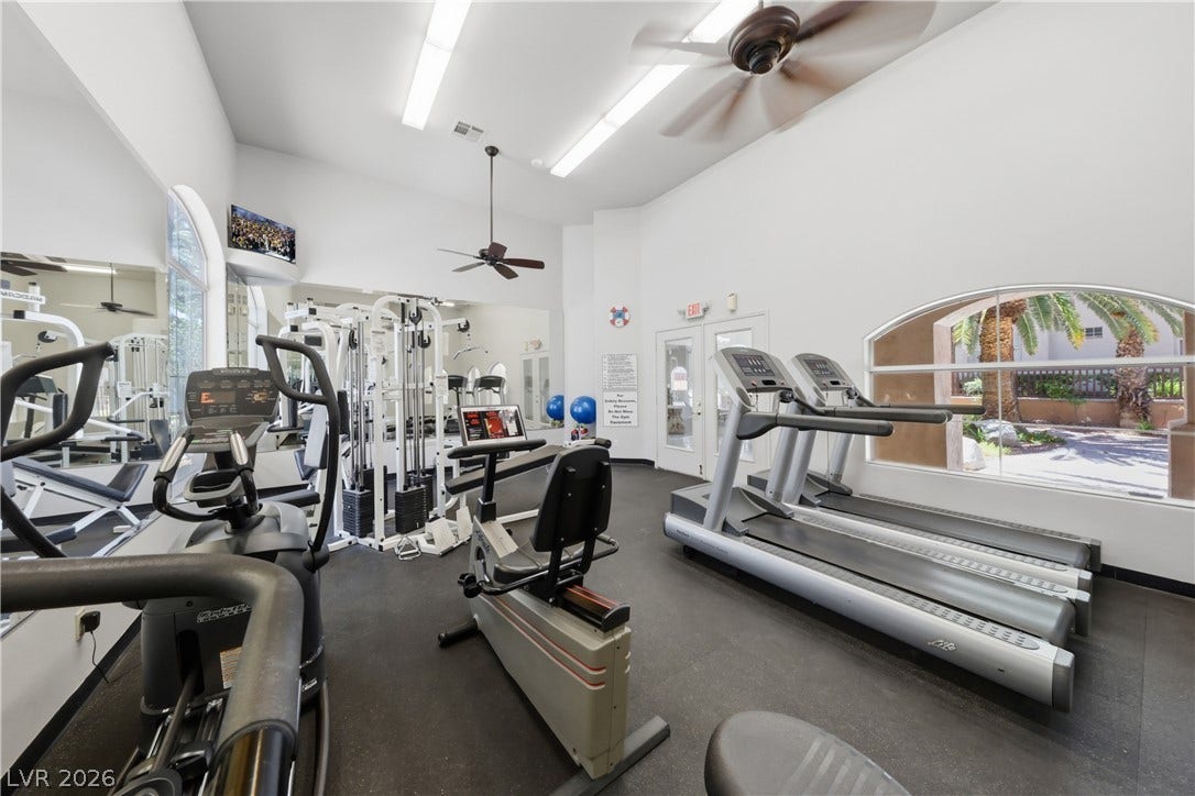 104 Lemon Glaze Street, #204, Las Vegas, NV 89145 High ceilings and large arched windows frame this light-filled exercise space.