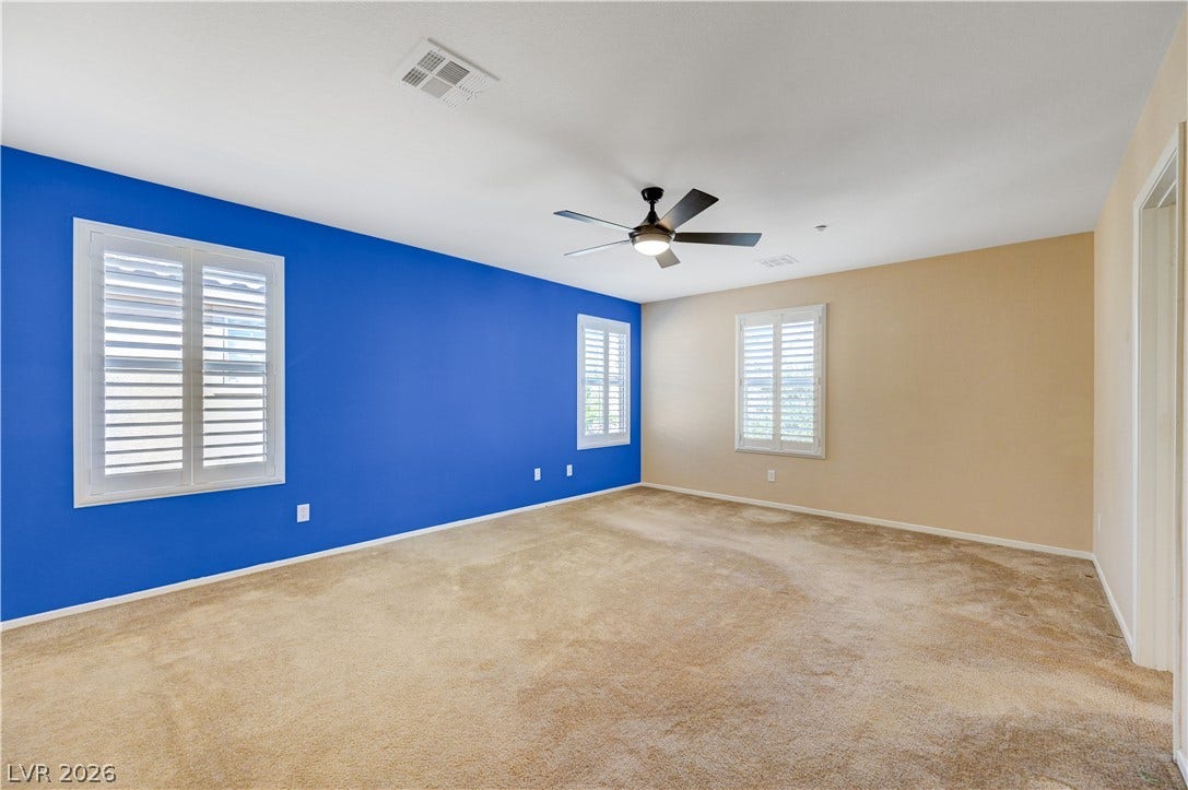 2088 Artistic Flair Walk, Henderson, NV 89044 Plentiful natural light streams through plantation shutters onto comfortable wall-to-wall carpeting.