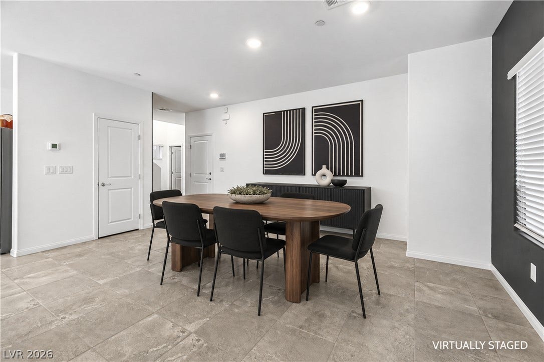 4429 Ginger Hills Avenue, Las Vegas, NV 89141 Recessed lighting and tile floors define this open dining space.