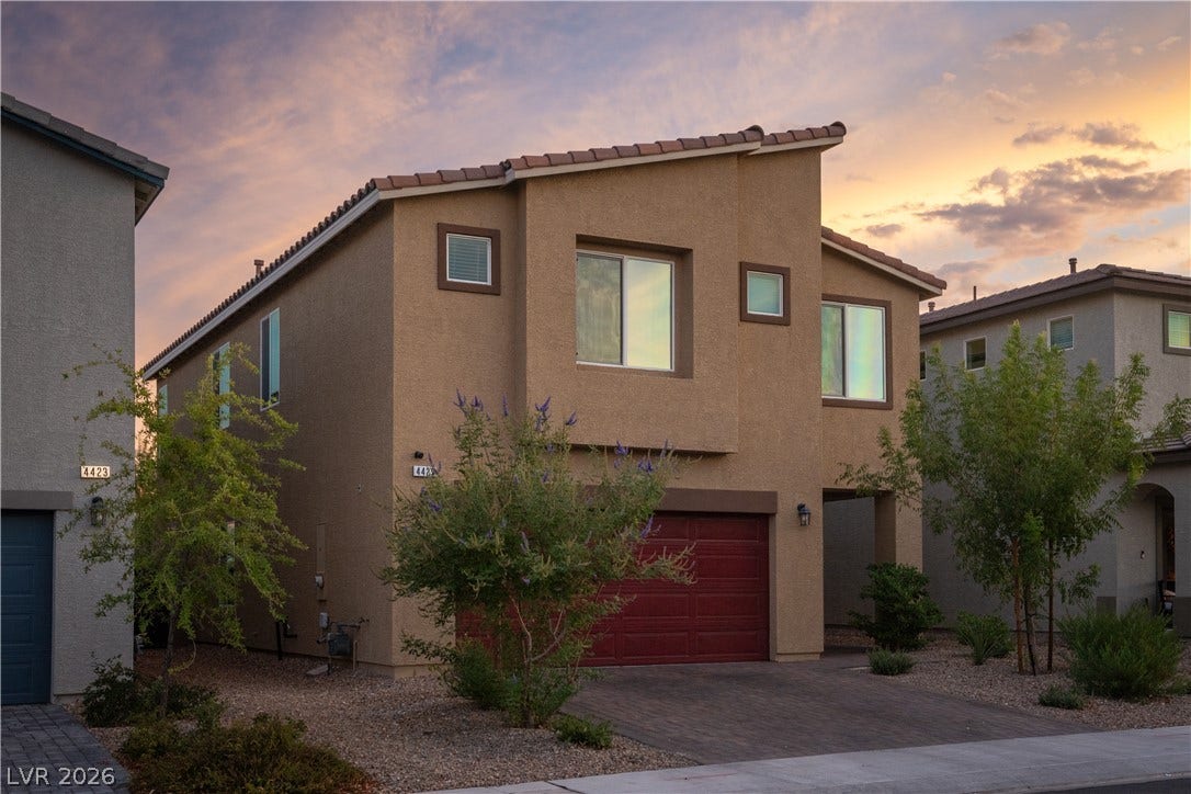 4429 Ginger Hills Avenue, Las Vegas, NV 89141 Clean lines and a warm stucco exterior define this contemporary two-story home.