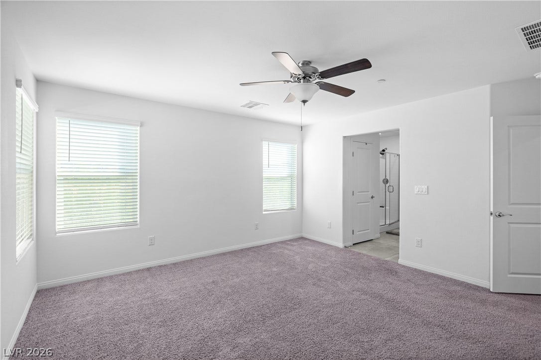 4429 Ginger Hills Avenue, Las Vegas, NV 89141 Plush carpeting and multiple windows anchor this peaceful retreat with an attached bath.