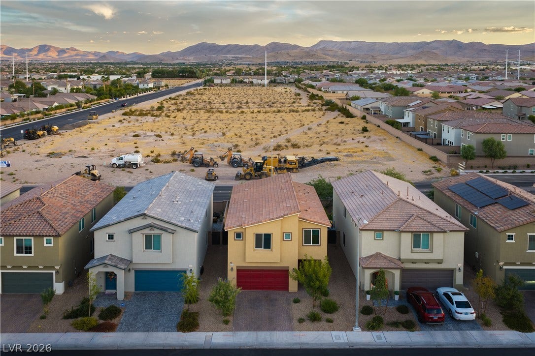4429 Ginger Hills Avenue, Las Vegas, NV 89141 Majestic mountain ridges provide a dramatic backdrop for this vibrant suburban neighborhood.