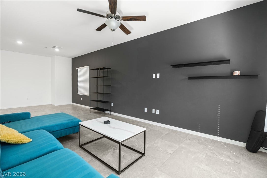 4429 Ginger Hills Avenue, Las Vegas, NV 89141 Gleaming tile floors and crisp recessed lighting enhance this versatile open space.