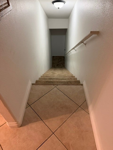 3676 Renovah Street, #205, Las Vegas, NV 89129 stairs from the garage, up to the condo.
