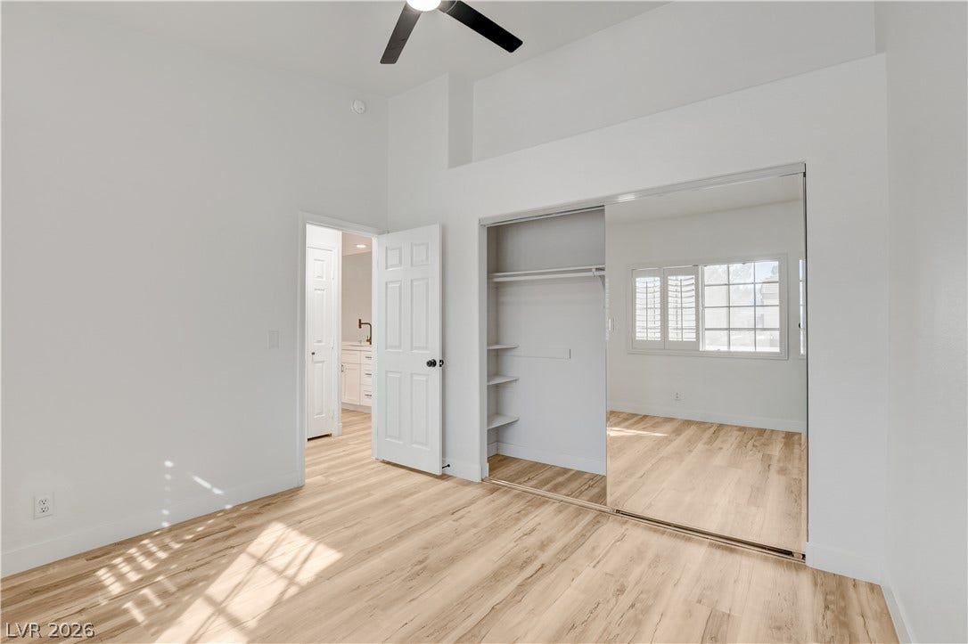 3676 Renovah Street, #205, Las Vegas, NV 89129 High ceilings and warm wood floors define this comfortable secondary bedroom.