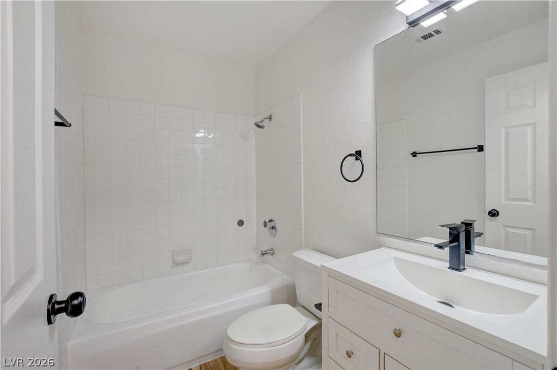 3676 Renovah Street, #205, Las Vegas, NV 89129 Clean lines and a tub-shower combination define this updated secondary bathroom.