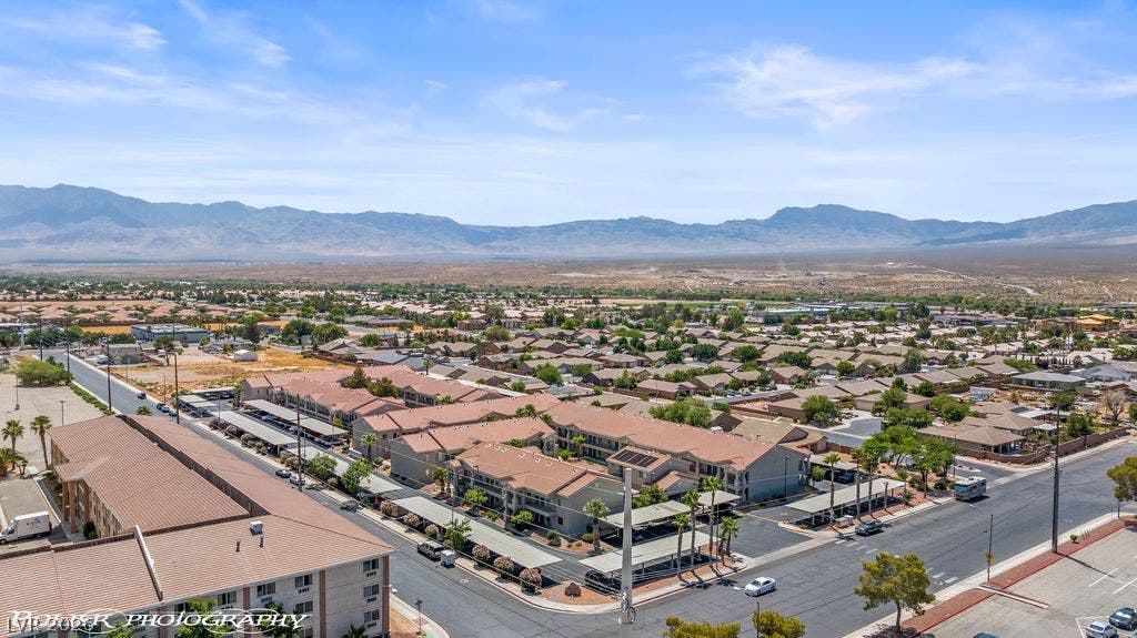 100 Pulsipher Lane, #1205, Mesquite, NV 89027 Majestic mountain ridges define the distant horizon beyond this tranquil residential neighborhood.