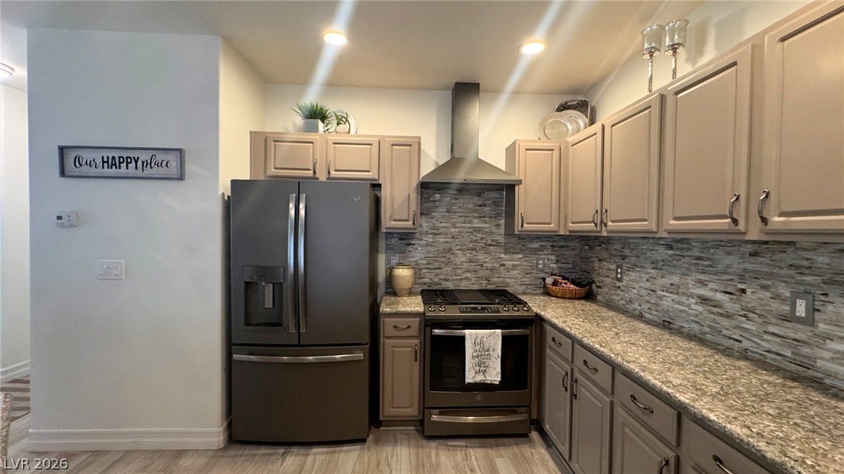 8304 Apple Glaze Avenue, #203, Las Vegas, NV 89145 Ample counter space and classic cabinetry define this well-appointed kitchen.