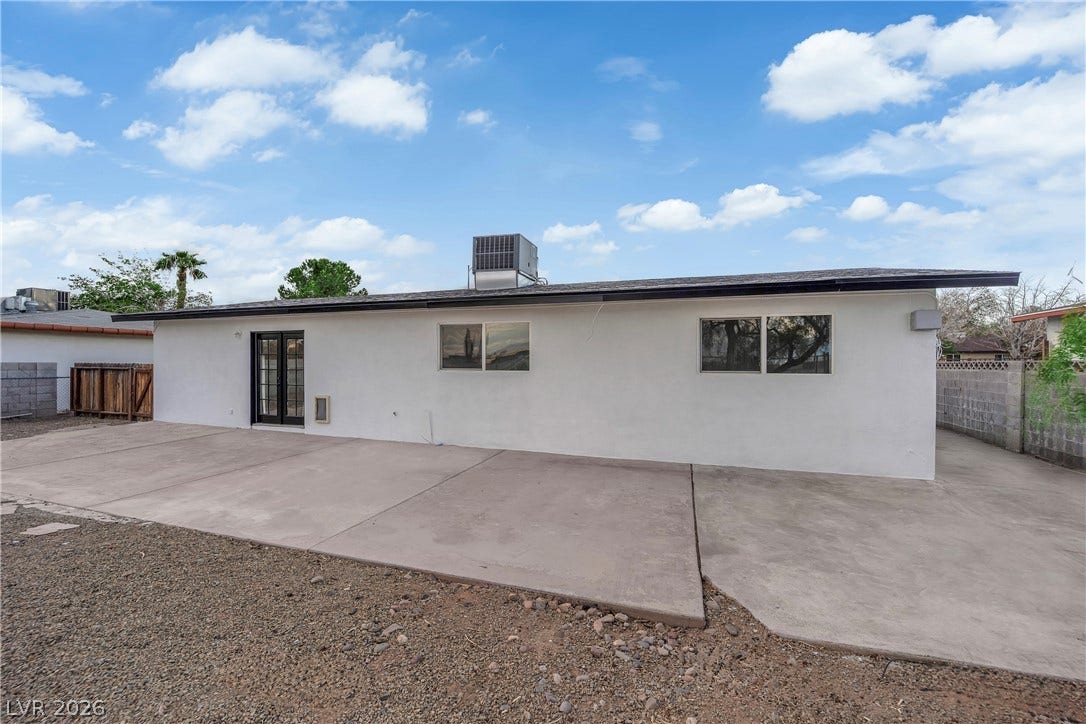 419 Scenic Drive, Henderson, NV 89002 An expansive concrete patio extends along the rear of this low-maintenance stucco home.