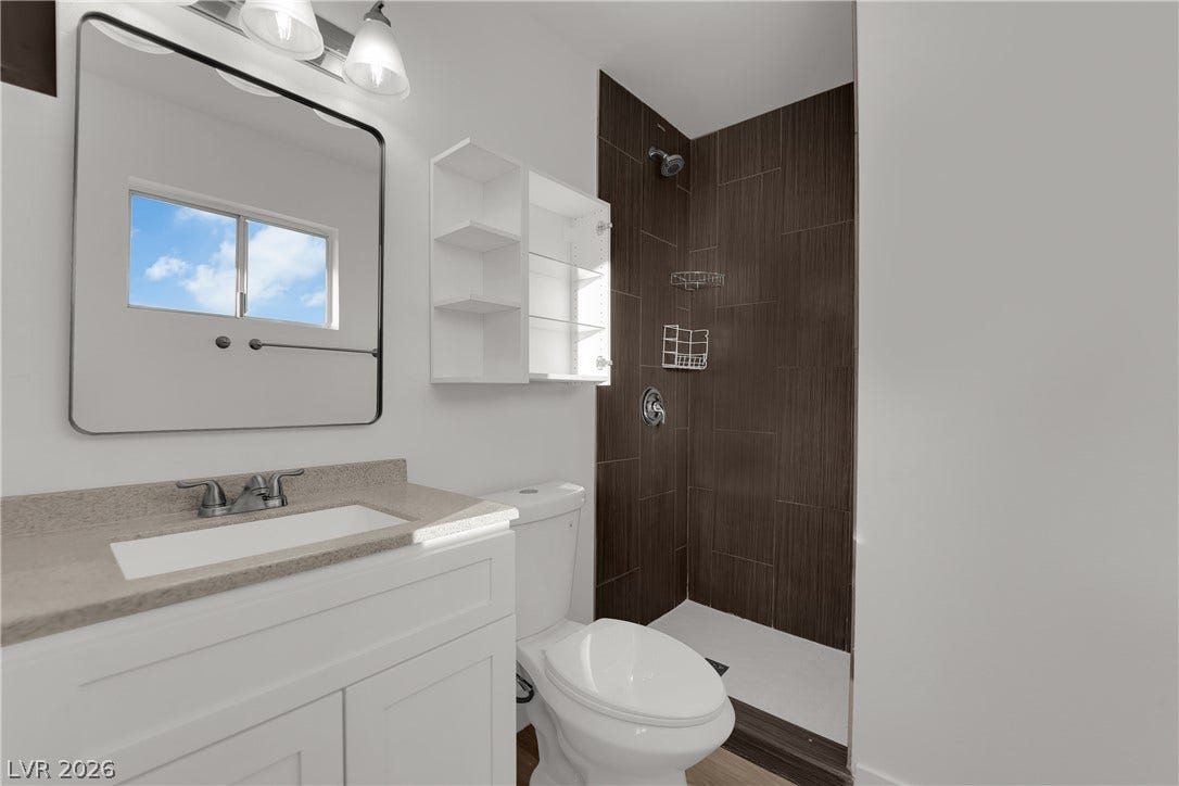 419 Scenic Drive, Henderson, NV 89002 Clean lines and modern tile finishes define this updated bathroom space.