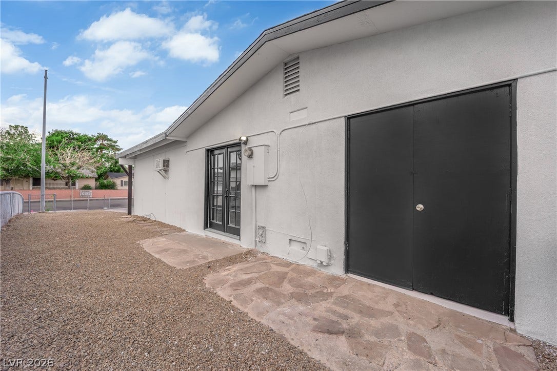 419 Scenic Drive, Henderson, NV 89002 French doors and durable stucco siding define the rear exterior of this home.