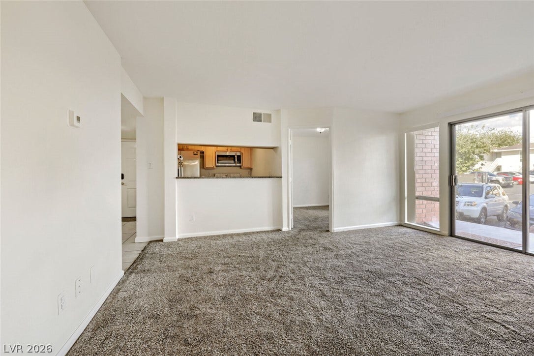 769 Oakmont Avenue, #403, Las Vegas, NV 89109 Breakfast bar pass-through to the kitchen.