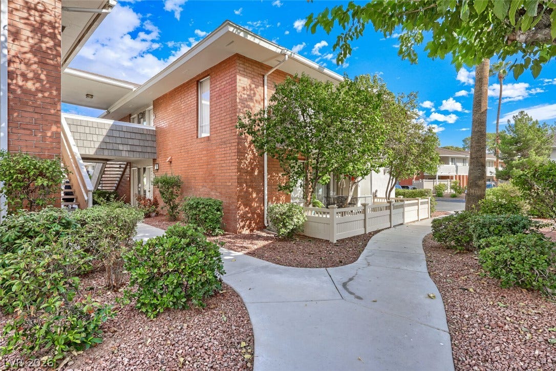 769 Oakmont Avenue, #403, Las Vegas, NV 89109 Curving concrete pathways wind through lushly landscaped grounds.