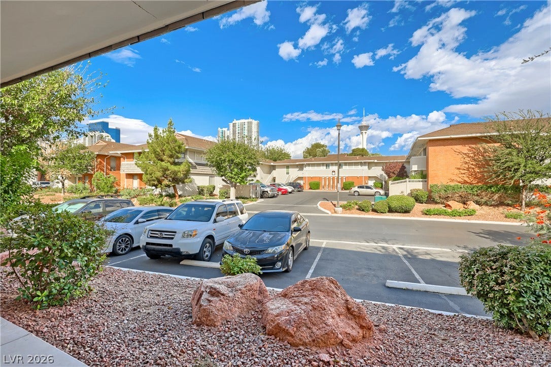 769 Oakmont Avenue, #403, Las Vegas, NV 89109 Distant skyline views highlight the neighborhood surrounding this community parking area.