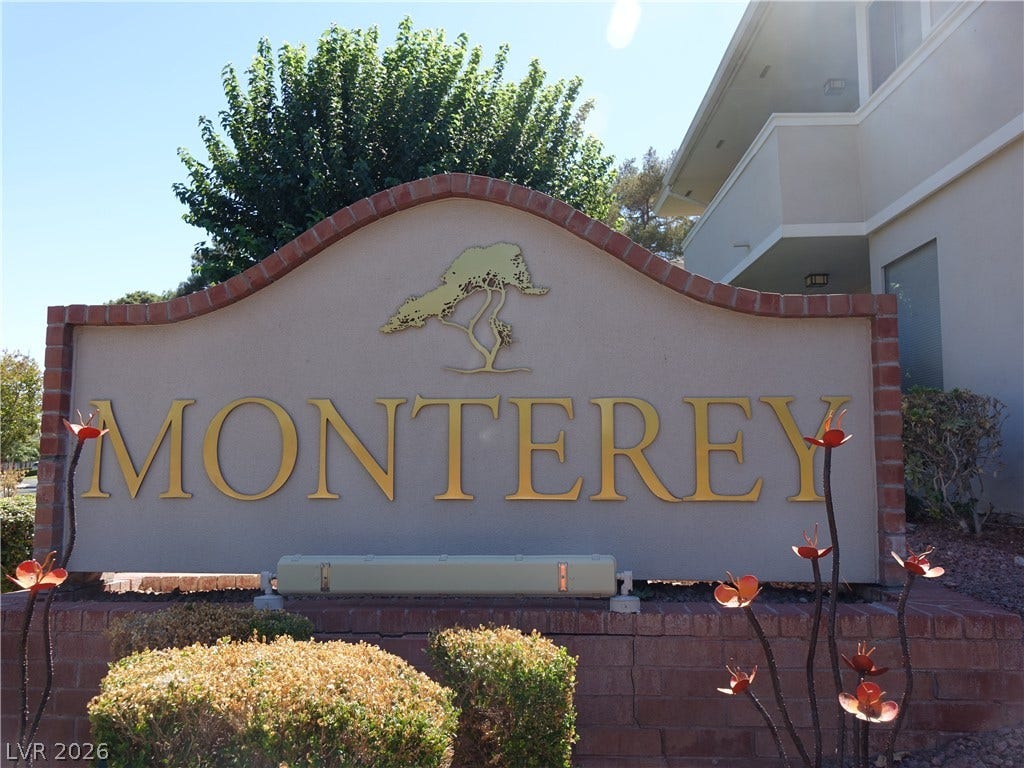 769 Oakmont Avenue, #403, Las Vegas, NV 89109 A prominent neighborhood sign marks the entry to this beautifully maintained residential community.