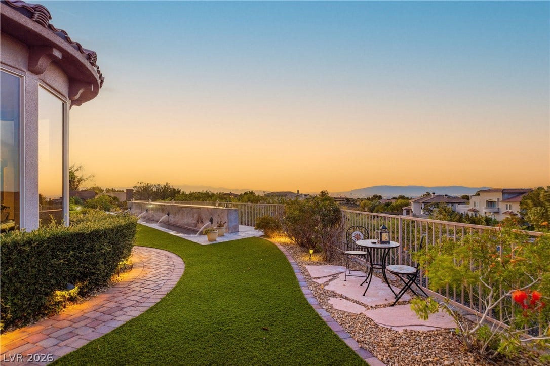 6 Brookridge Drive, Henderson, NV 89052 Sweeping mountain views elevate this manicured backyard retreat with its stone walkways and scenic overlook.