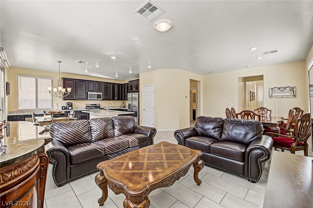 3813 Birch River Street, North Las Vegas, NV 89032 An open concept design connects the spacious living room directly to the kitchen area.