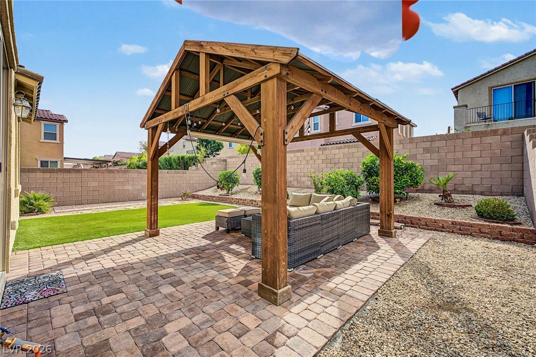 3813 Birch River Street, North Las Vegas, NV 89032 An inviting backyard retreat features a handsome wooden gazebo over a brick paver patio.