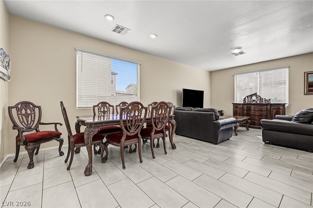 3813 Birch River Street, North Las Vegas, NV 89032 Clean tile flooring and abundant natural light define this versatile open dining space.