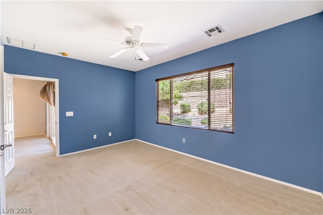 2488 Galaxy Cluster Street, Henderson, NV 89044 Owners Suite with Ceiling Fan, Walk-In Closet, and Bathroom with Dual Sinks, Shower, Linen Closet, and Tile Flooring