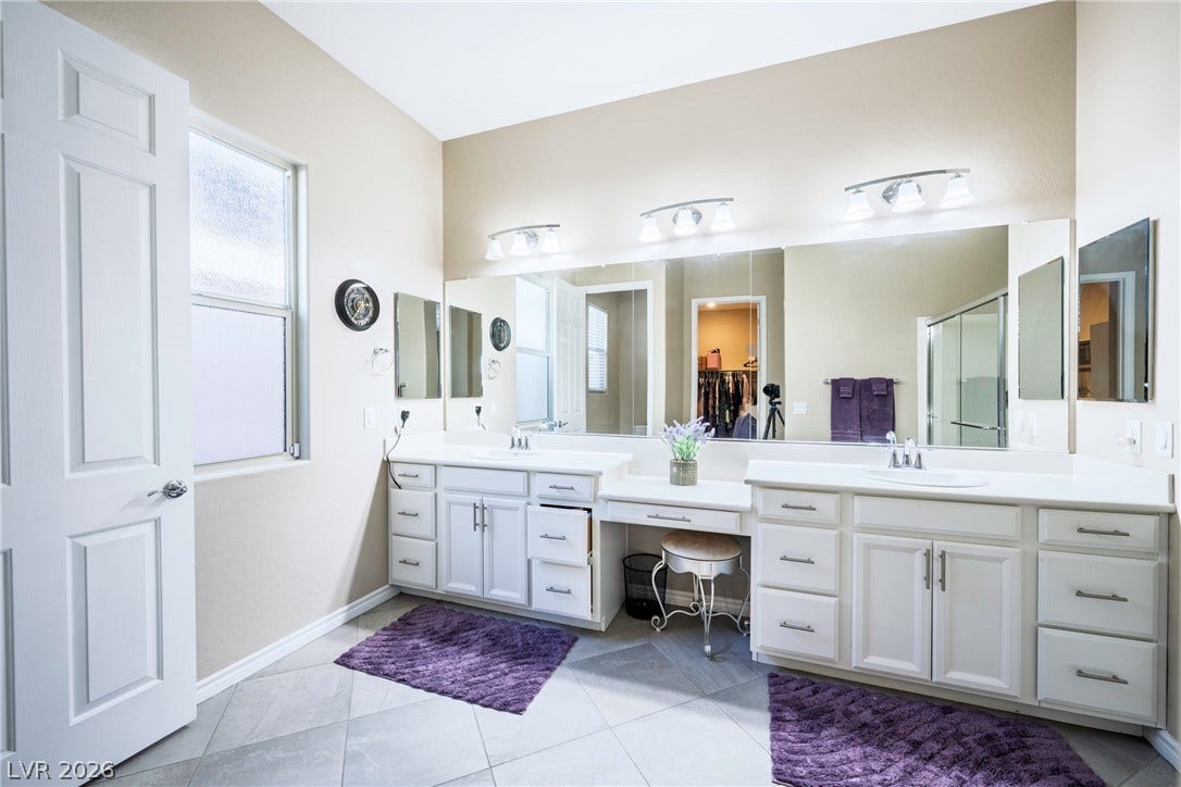 Ample cabinetry and tile floors define this well-appointed space.