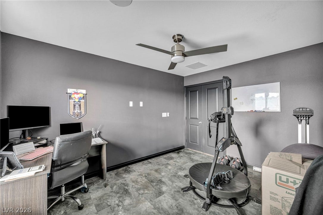 1205 Deep Valley Avenue, North Las Vegas, NV 89084 Versatile home office space includes textured stone-look tile flooring and clean contemporary doors.