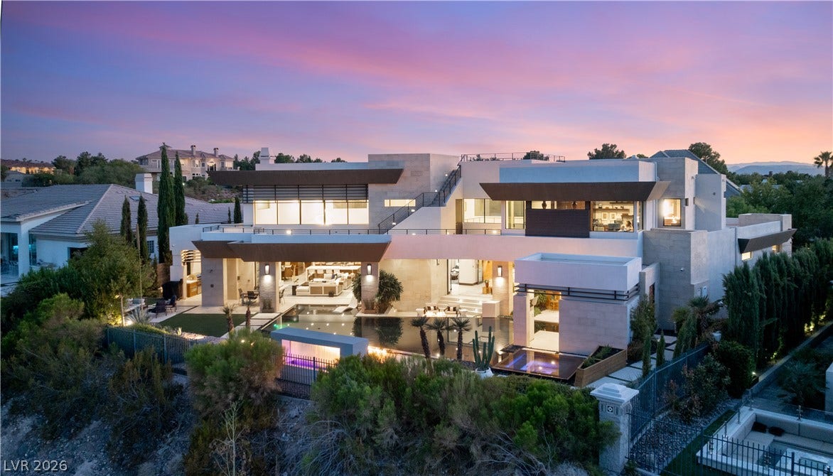 1269 Imperia Drive, Henderson, NV 89052 Dramatic modern architectural lines frame a multi-level terrace integrated with a custom pool structure.