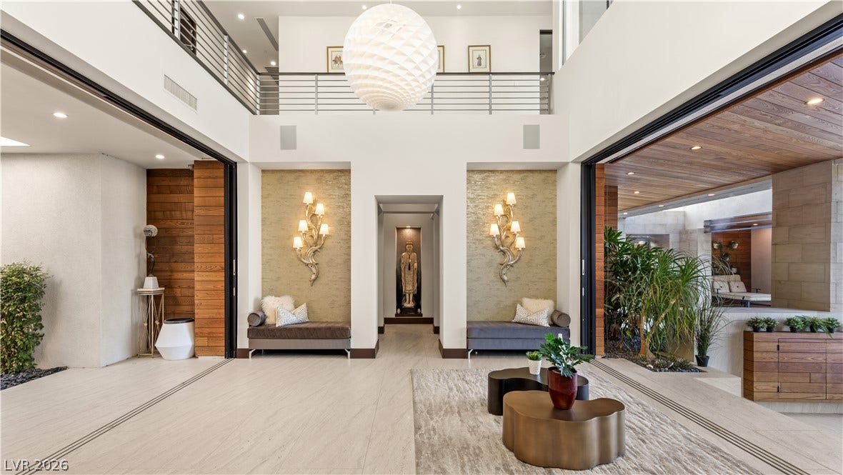 1269 Imperia Drive, Henderson, NV 89052 Soaring ceilings and pocketing doors create a seamless transition to the outdoors.