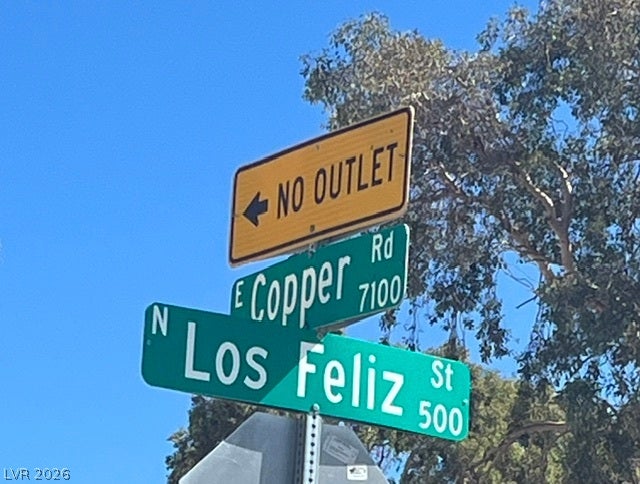 520 Los Feliz Street, Las Vegas, NV 89110 Street signage marks the neighborhood intersection under a clear blue sky.