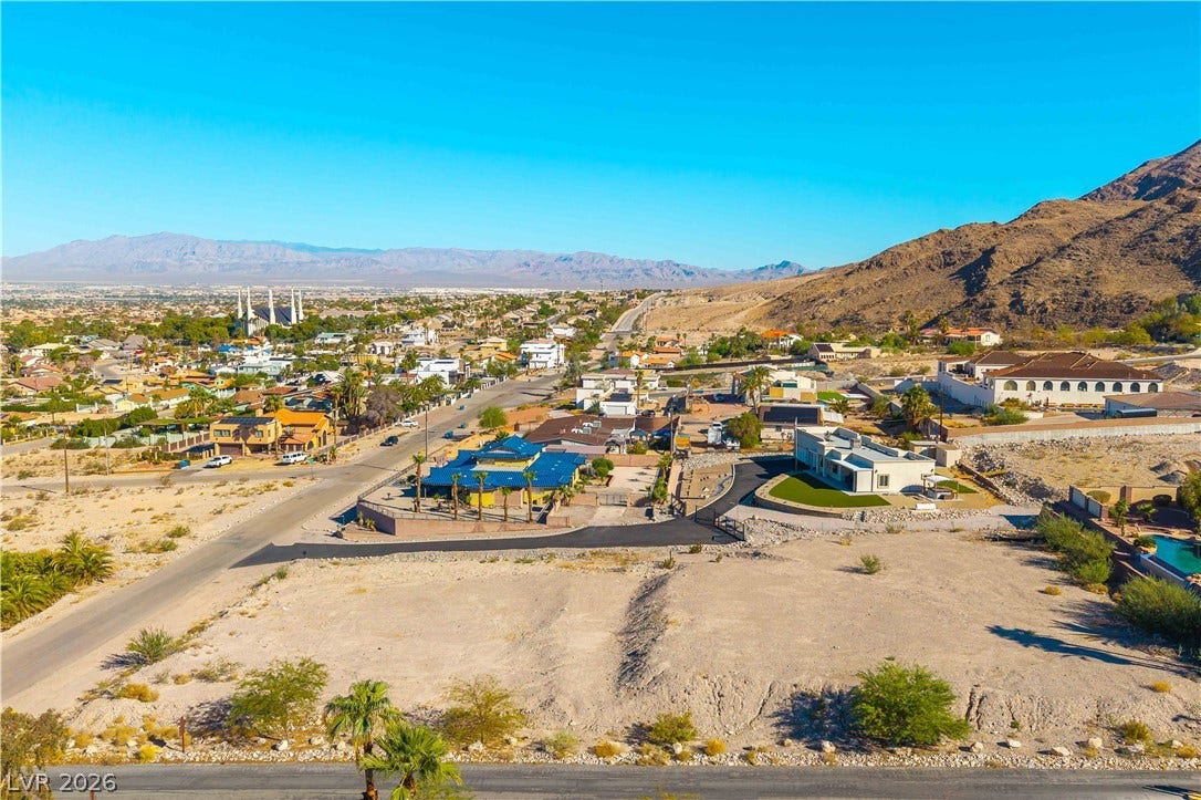 520 Los Feliz Street, Las Vegas, NV 89110 Panoramic mountain and neighborhood views extend across this desert lot and surrounding valley.