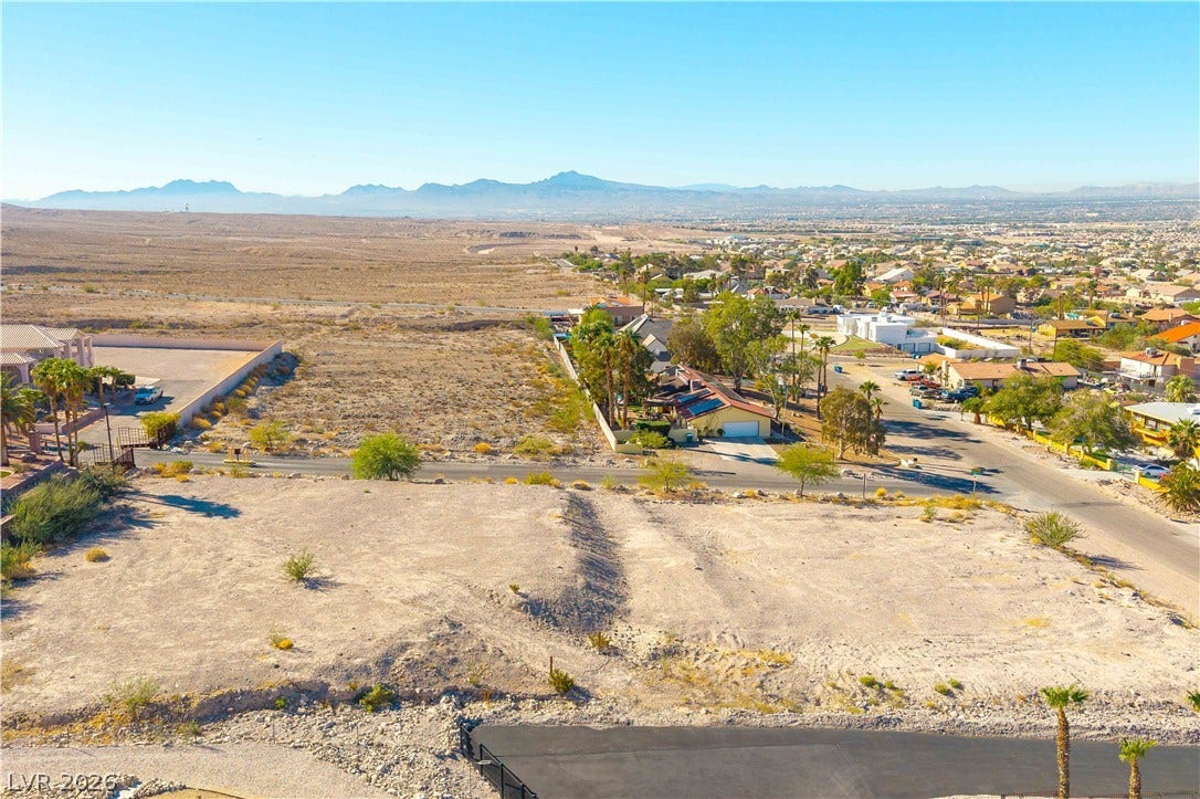 520 Los Feliz Street, Las Vegas, NV 89110 Panoramic mountain and desert vistas surround this expansive vacant building parcel.
