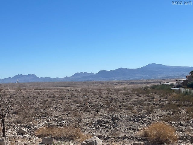520 Los Feliz Street, Las Vegas, NV 89110 Rugged mountains frame the horizon of this vast desert lot.