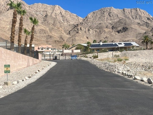 520 Los Feliz Street, Las Vegas, NV 89110 An asphalt road to property at end of street.