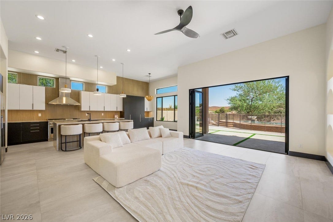 18 Wade Hampton Trail, Henderson, NV 89052 An open floorplan seamlessly connects the living space to the kitchen and outdoor patio.