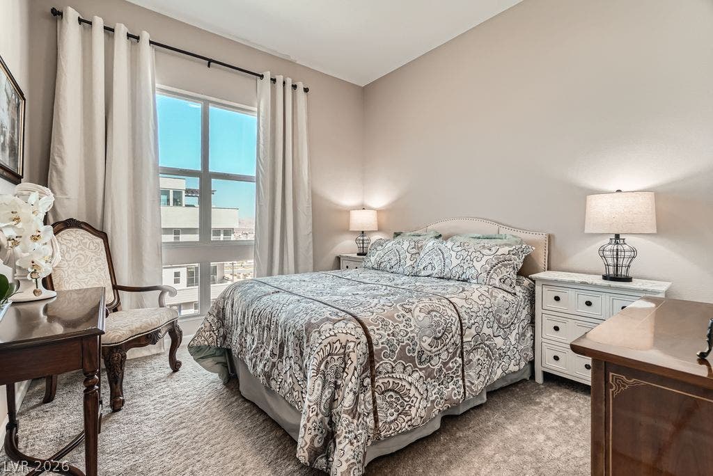 2507 Silent View Avenue, Henderson, NV 89044 High ceilings and a large window create an airy feeling in this quiet bedroom.