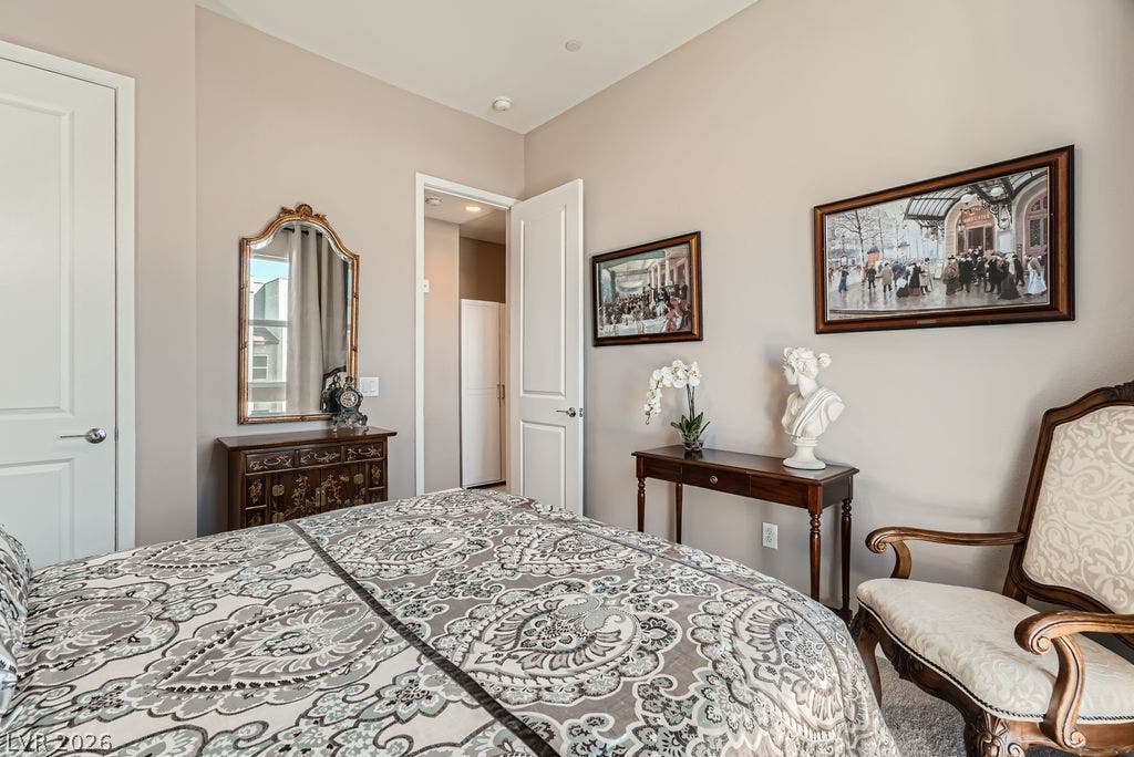 2507 Silent View Avenue, Henderson, NV 89044 Smooth plaster walls and high ceilings create a serene, well-proportioned bedroom atmosphere.