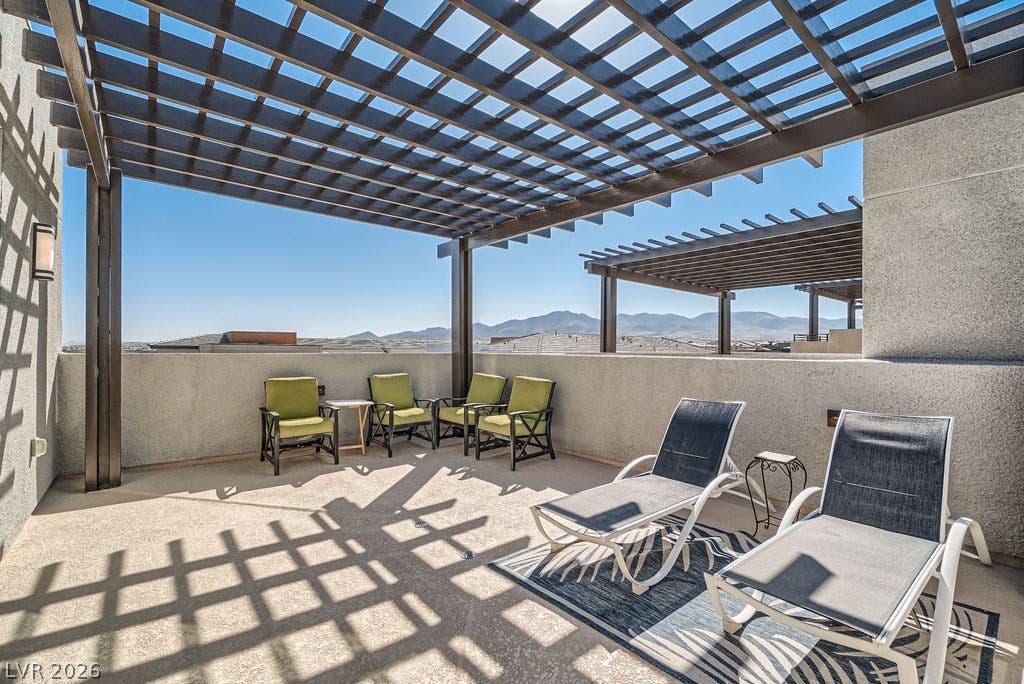 2507 Silent View Avenue, Henderson, NV 89044 An open rooftop terrace with structural pergolas frames sweeping mountain views.
