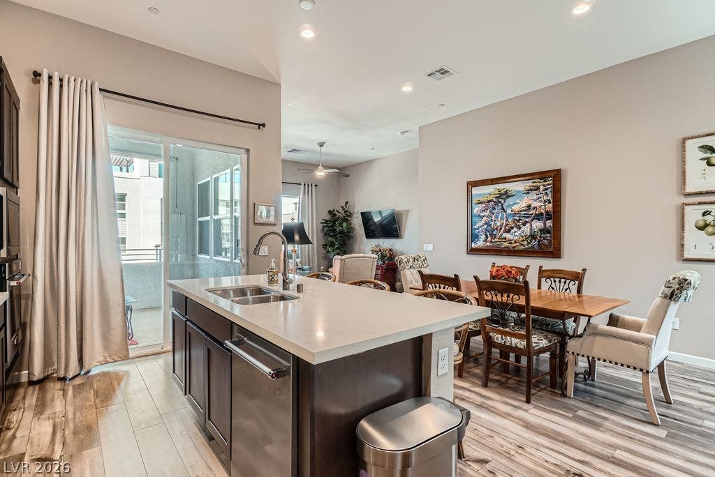 2507 Silent View Avenue, Henderson, NV 89044 An open-concept living area connects the functional kitchen island directly to the dining room.
