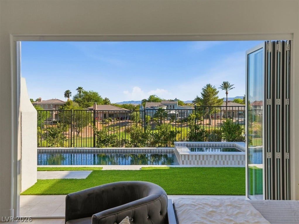 3074 Soft Horizon Way, Las Vegas, NV 89135 Retreat to a private outdoor oasis with a sparkling pool and spa, framed by an open view of the neighborhood.